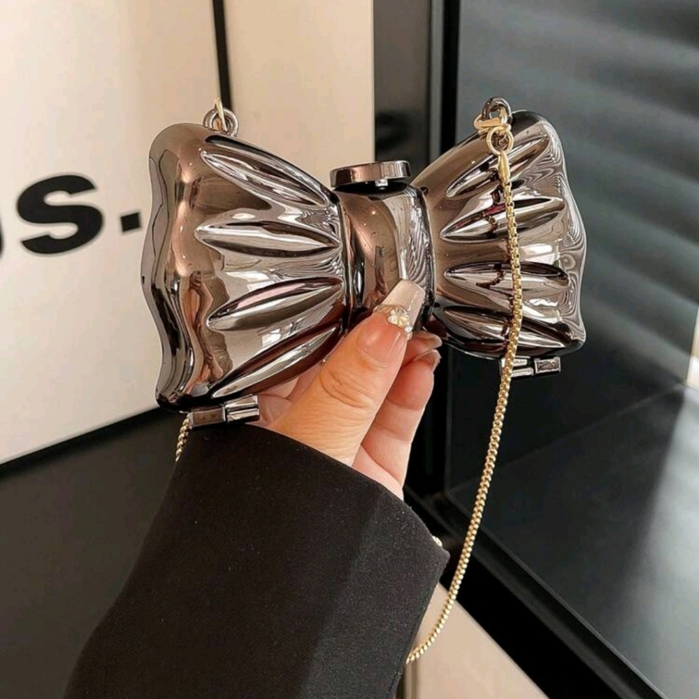 SALE ** PRICE AS MARKED  ** Copper Bow-Shaped Clutch Bag